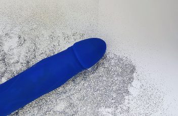 Feature photo of Sliquid lube being dripped onto the We Vibe Jive against a blue background.