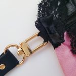 Image demonstrating the Ann Summers Flex Rechargeable Clit Stim Flexibility. Image shows my hand bending the bulging head end of the vibrator at a 90 degree angle.