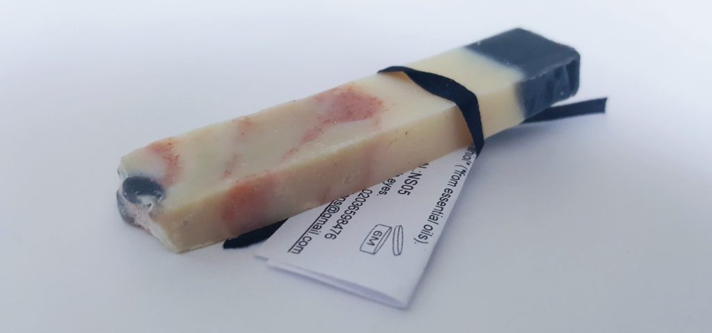 Photo of GK Natural Creations - Neroli Soap. A small rectangular bar of soap.