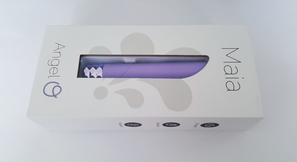 Image of the Maia Angel Crystal Gems Bullet Vibrator Packaging. A white rectangular box with window showing the Maia Angel.